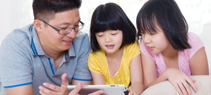 Family Literacy, Father Reading with Daughters